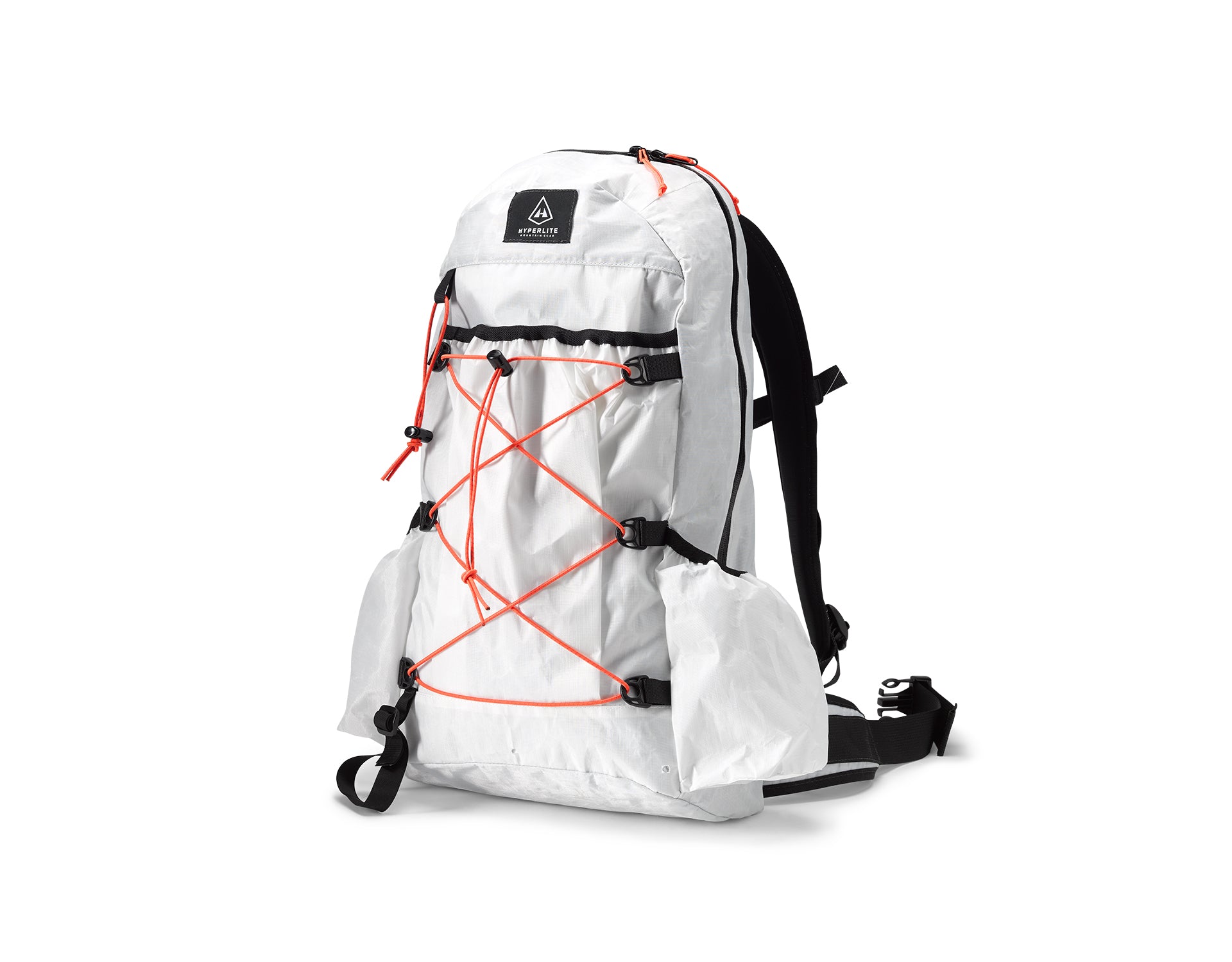 A white backpack with orange straps.