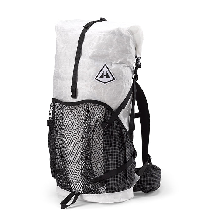 A white and black backpack with a mesh on the back.