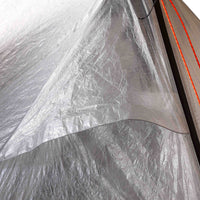 A close up of a tent in a plastic bag.