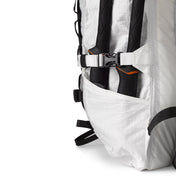 Close up side view of the Hyperlite Mountain Gear Crux 40 showing the low profile side sleeve pockets
