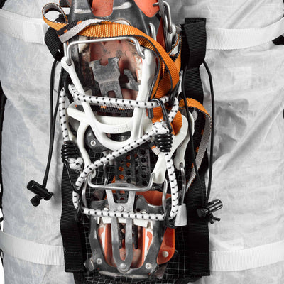 Detail shot of gear strapped in the Hyperlite Mountain Gear Ice Pack 55