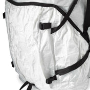 Close up shot of the exterior straps on Hyperlite Mountain Gear's NorthRim 70 Pack in White