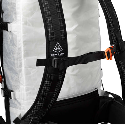 Detail shot of the chest strap and buckle on Hyperlite Mountain Gear's Porter 55 Pack in White