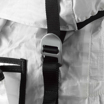 Detail shot of the exterior strap on Hyperlite Mountain Gear's Prism 40 in White