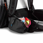 Energy bars loaded into the side pockets of the removable hip belt on the Hyperlite Mountain Gear Unbound 55