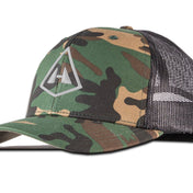 Left side view of Hyperlite Mountain Gear's Trucker Hat in Camoflauge and Black