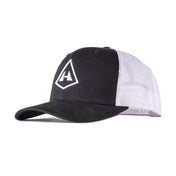 Left side view of Hyperlite Mountain Gear's Trucker Hat in Black and White