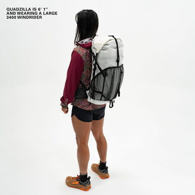 Right side view of Hyperlite Mountain Gear's Windrider 70 Pack in White on model