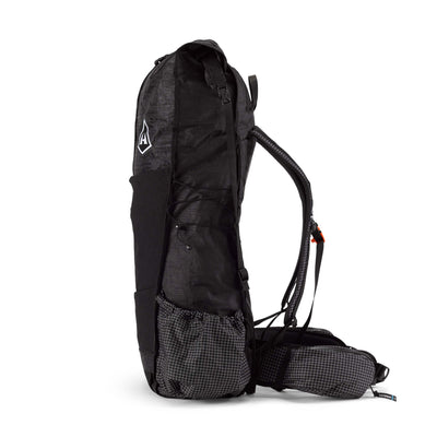 Side view of the Hyperlite Mountain Gear Unbound 55 in Black showcasing the oversized side pockets