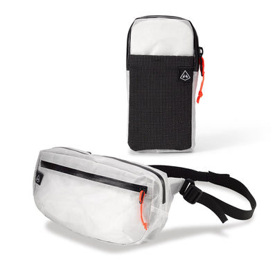 Studio image of a Hyperlite Mountain Gear Versa and Shoulder Pocket in White, both included in the Accessory Bundle