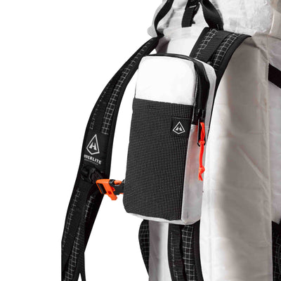 Front view of Hyperlite Mountain Gear's Shoulder Pocket in White on a Backpack Strap