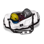 Overhead view of the Hyperlite Mountain Gear 140L Approach Duffel open and filled with climbing gear