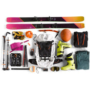 Overhead view of an empty Hyperlite Mountain Gear Crux 40 with all the necessary gear for a trip laid out around it