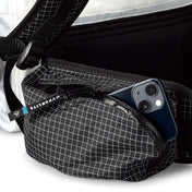 Hyperlite Mountain Gear's Porter 70 Pack's pocket with a smartphone for on-the-go connectivity
