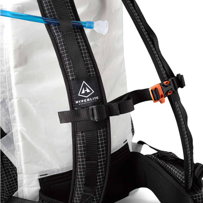 Detail shot of Hyperlite Mountain Gear's White Southwest 40 Pack's water reservoir and chest strap