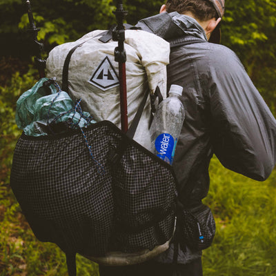 Hiker wearing the Southwest 40 Pack in White 