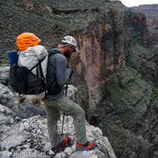 Hyperlite Mountain Gear's Southwest 70 Pack in White on a hikers back in the canyon 