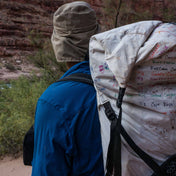 Hyperlite Mountain Gear's Southwest 70 Pack in White on hikers back