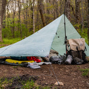 Exterior shot of a campers Hyperlite Mountain Gear Flat Tarp in Spruce Green