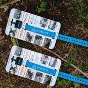 Close up shot of the logo on Hyperlite Mountain Gear's UltaMid Pole Straps in 15" Blue