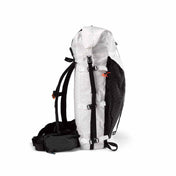 Side view of the Hyperlite Mountain Gear Headwall 55 in White showing the six dual-adjustable side compression straps for attaching skis or splitboard in A-frame carry