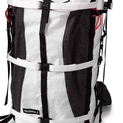 Front view of the Hyperlite Mountain Gear Headwall 55 including the DCH150 avalanche pocket and adjustable side straps