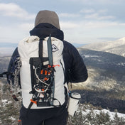 Hyperlite Mountain Gear's Ice Pack 40 in White on the mountain