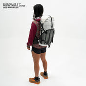 Right side view of Hyperlite Mountain Gear's Windrider 55 Pack in White on model