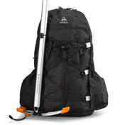 Front view of Hyperlite Mountain Gear's Daybreak 17 Pack in Black with gear strapped in the bungees