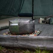 Front view of Hyperlite Mountain Gear's 10L Side Entry Pod on a tent floor