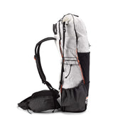 Side view of the Hyperlite Mountain Gear Unbound 55 in White showing the oversized side pockets made of hardline with Dyneema®